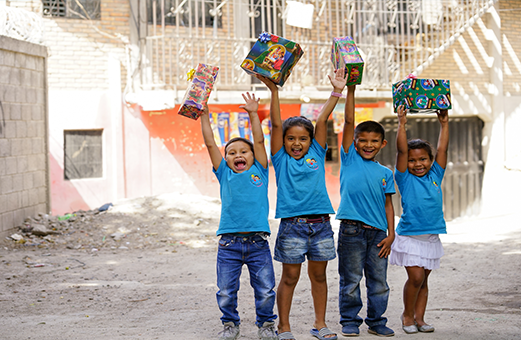 Kids with Christmas gifts small