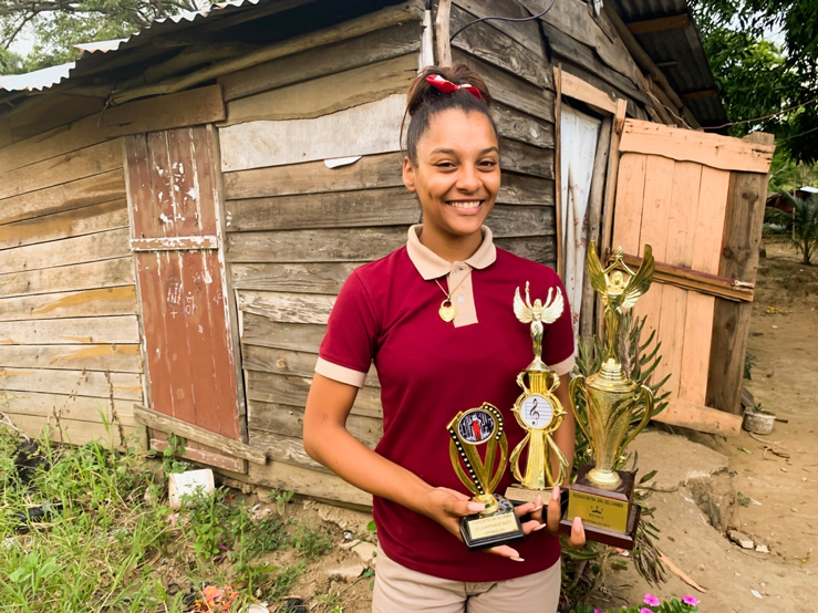 Andreina in Dominican Republic with trophies