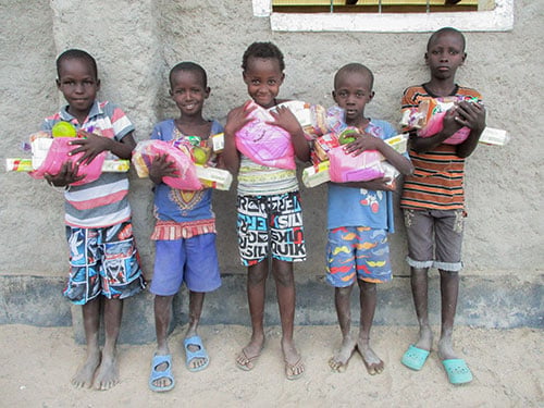 Hope Centers Christmas Celebration in Kenya boys with gifts