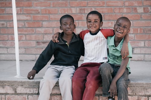 A Simple Gift That Meant So Much Christmas in Zimbabwe boys smiiling