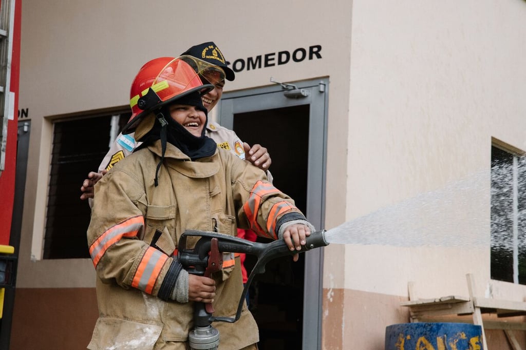 Jose Fabian with firehose