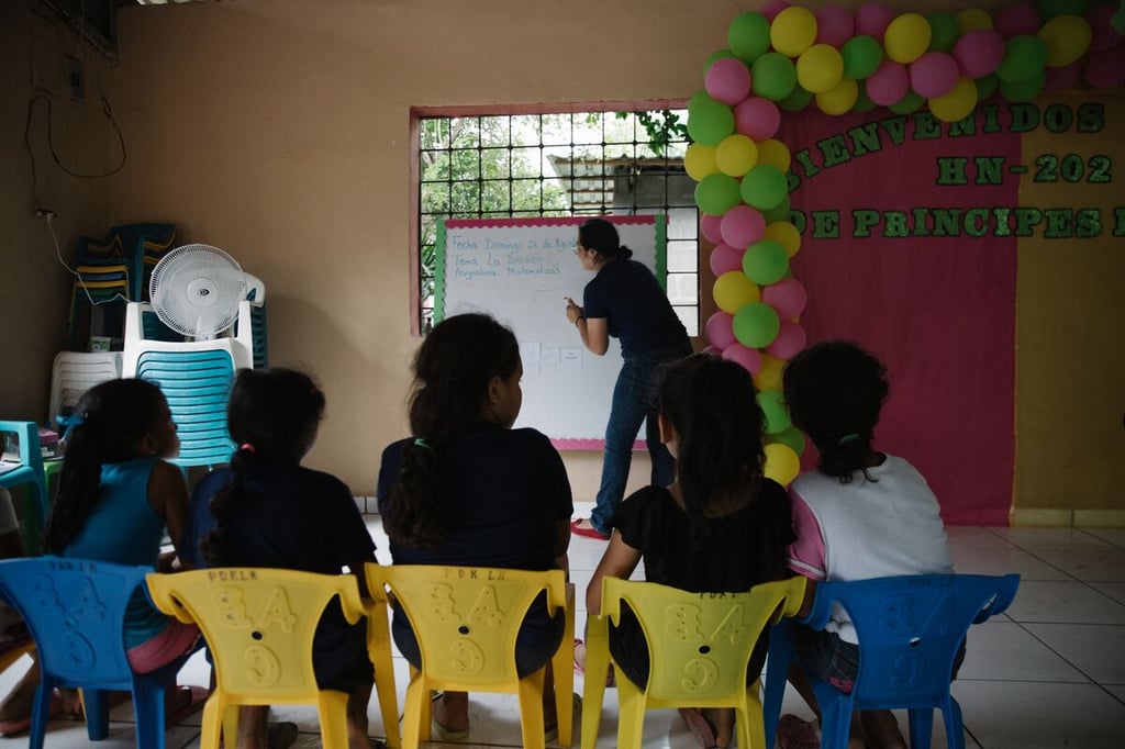Yosari teaching with kids
