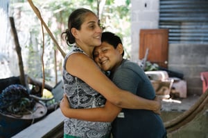 Carlos mom hugging