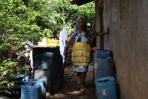 Grandmother outside home