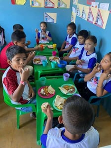 Kids eating at hope center