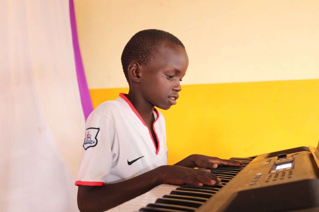 Leon playing piano