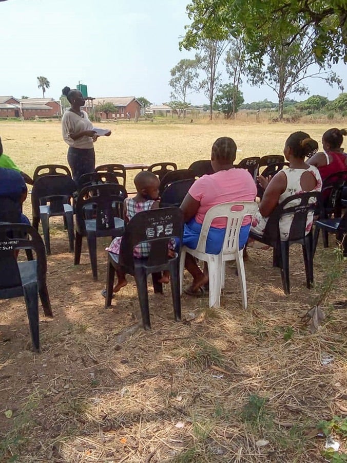 Tatenda with parents group