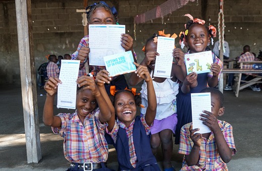 Kids holding letters